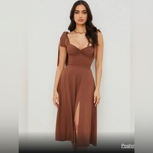 Chocolate brown dress with tie sleeves and slit.
